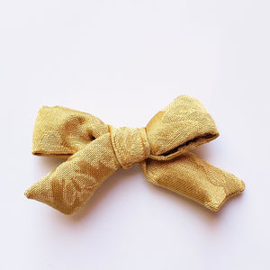 Vintage bright gold Elloise bow